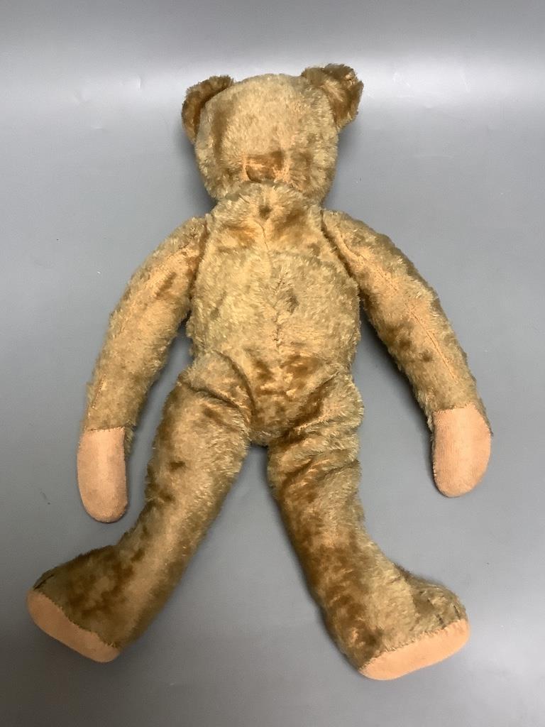 A vintage teddy bear DAN TO REPORT